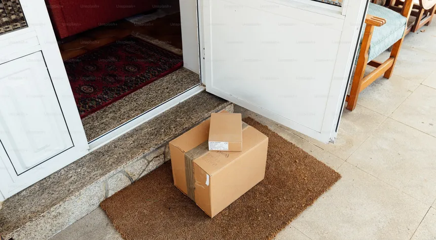 Delivered packages left on a doormat, the moment an electric trike purchase becomes a physical problem